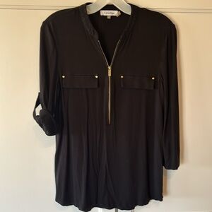 Calvin Klein Women’s black 3/4 sleeve zip front top w/ gold detail. Size Small